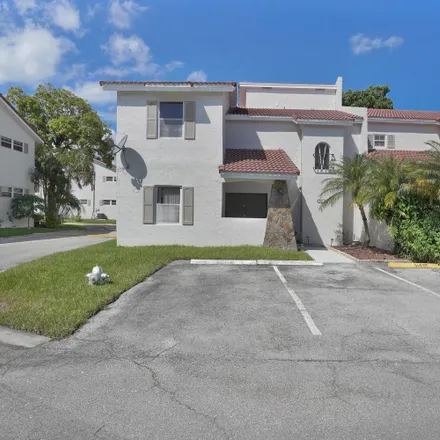 Buy this 4 bed townhouse on 7405 Champagne Place in Palm Beach County, FL 33433