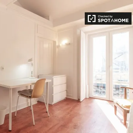 Rent this 4 bed room on Rua Filipe Folque 5 in 1050-999 Lisbon, Portugal