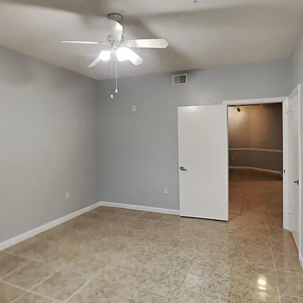 Rent this 2 bed apartment on Metrowest Boulevard in Orlando, FL 32811