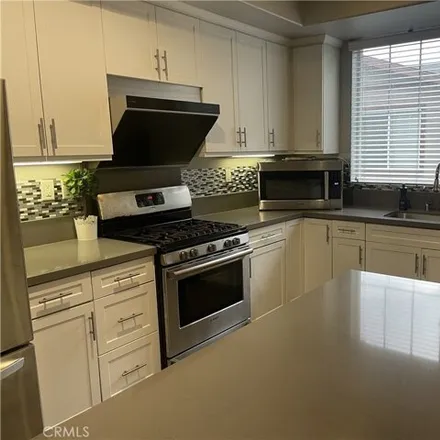 Rent this 3 bed condo on East Newburgh Street in CA 91702, USA