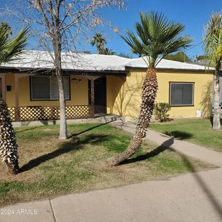 Rent this 3 bed house on 452 East 1st Street in Mesa, AZ 85203