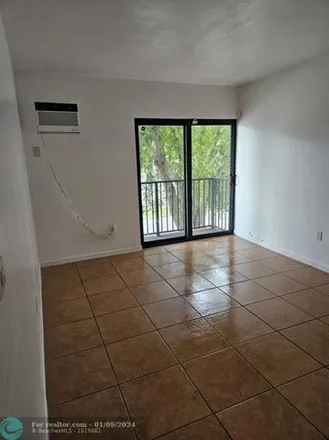 Rent this 2 bed apartment on 170 Northwest 59th Street in Edison Center, Miami