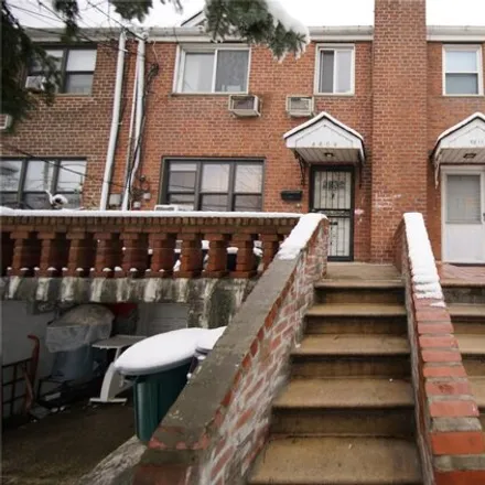 Buy this 6 bed townhouse on 48-09 65th Place in New York, NY 11377