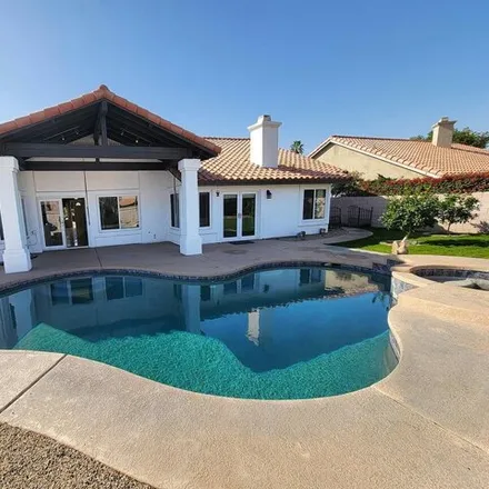 Buy this 4 bed house on 44205 Villeta Drive in La Quinta, CA 92253