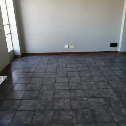 Rent this 1 bed apartment on unnamed road in Rossmore, Johannesburg