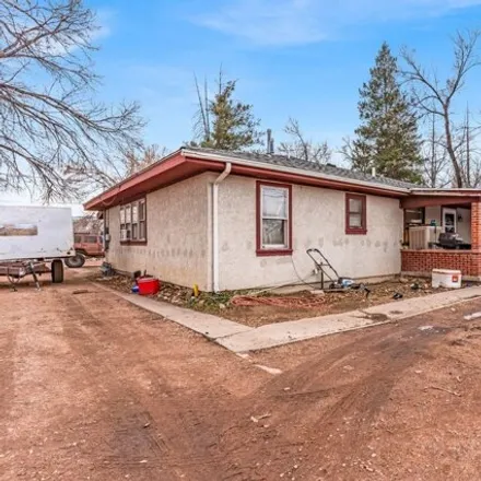Buy this 9 bed house on 1522 Elm Avenue in Lincoln Park, Fremont County