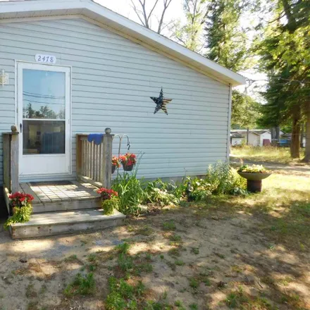 Buy this 3 bed house on 2428 East 3rd Street in Skidway Lake, Mills Township