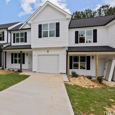Rent this 4 bed townhouse on 103 Country Valley Place in Clayton, NC 27527