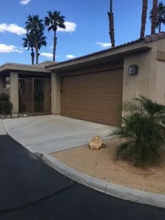 Rent this 2 bed condo on 48598 Desert Flower Drive in Palm Desert, CA 92260