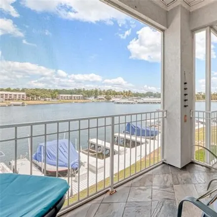 Buy this 2 bed condo on Shell in Lake Point Boulevard, Conroe