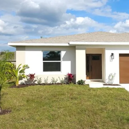 Buy this 3 bed house on 1828 Trapper Avenue Southeast in Palm Bay, FL 32909