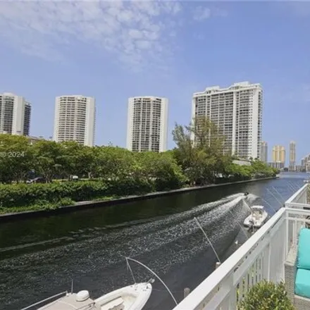 Rent this 2 bed house on 3745 NE 171st St Apt 75 in North Miami Beach, Florida