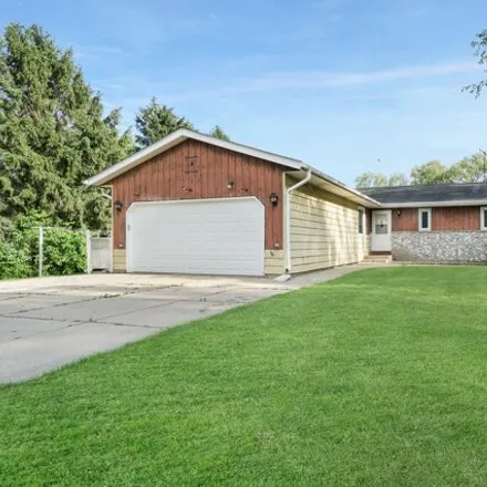 Buy this 3 bed house on 827 Newark Dr E in Wisconsin, 53090
