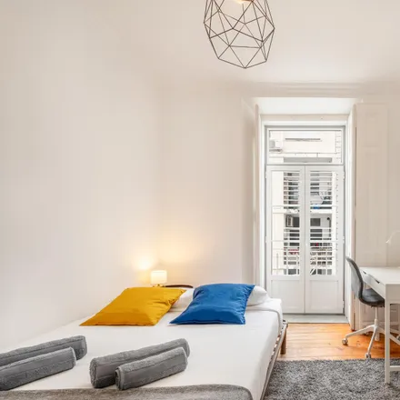 Rent this 4 bed room on Travessa do Pinheiro 14 in 1200-747 Lisbon, Portugal