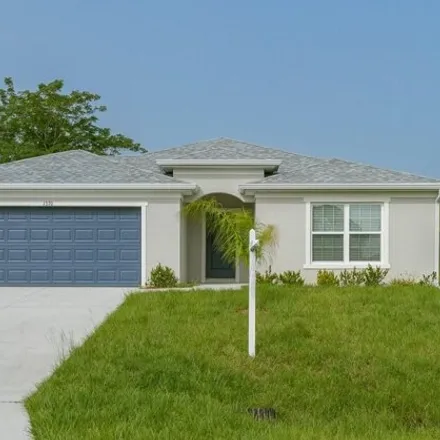 Buy this 4 bed house on 899 Brickell Street Southeast in Palm Bay, FL 32909