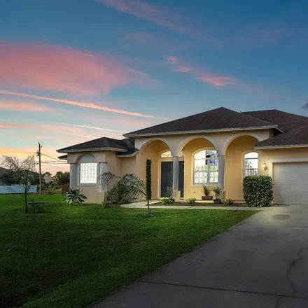 Buy this 4 bed house on 4374 Southwest Savona Boulevard in Port Saint Lucie, FL 34953