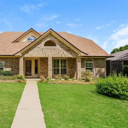 Rent this 3 bed house on 1617 Palisades Drive in Carrollton, TX 75007