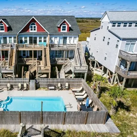 Buy this 4 bed townhouse on 3870 Island Drive in Ocean City Beach, North Topsail Beach