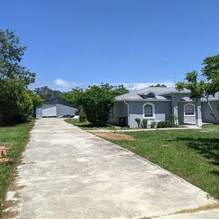 Rent this 3 bed house on 4040 Rolling Hills Court West in Polk County, FL 33898