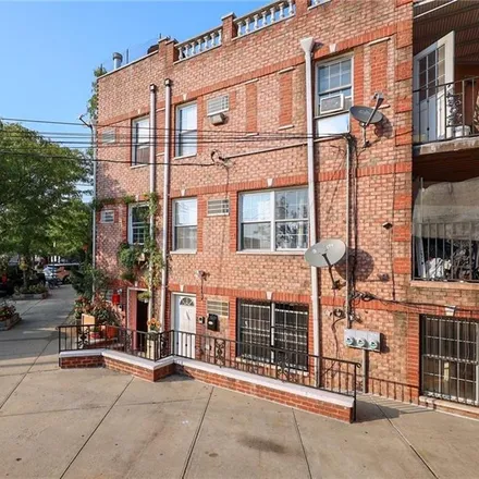 Buy this 4 bed townhouse on 47-10 99th Street in New York, NY 11368