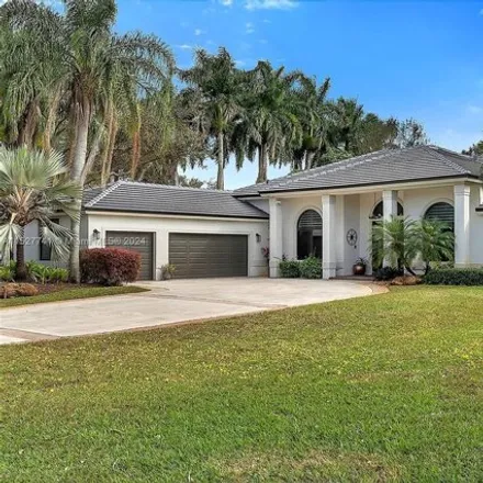 Rent this 5 bed house on 3568 Fairfax Lane in Davie, FL 33330