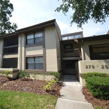 Rent this 2 bed condo on 139 Woodlake Wynde in Palm Harbor, FL 34677
