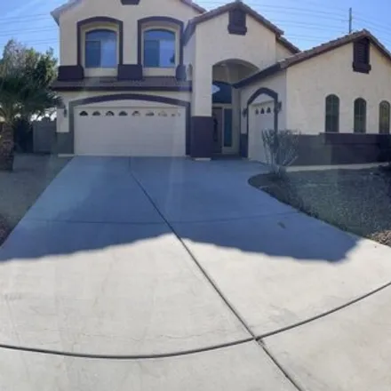 Rent this 4 bed house on 24155 West Desert Bloom Street in Buckeye, AZ 85326