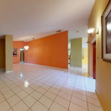 Buy this 3 bed apartment on 8830 Northwest 150Th Street in West Lakes Gardens, Miami Lakes