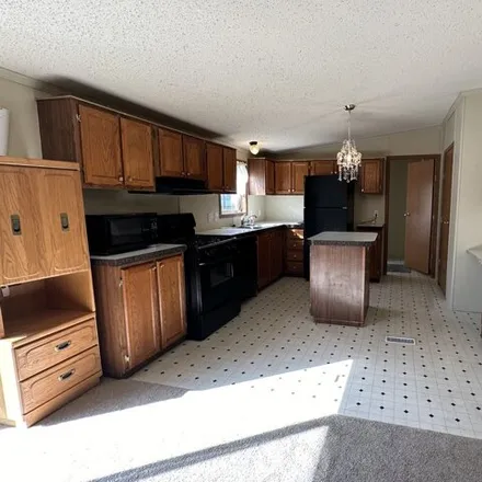 Buy this studio apartment on 221 East Scarlet Oak Drive in Coopersville, Ottawa County