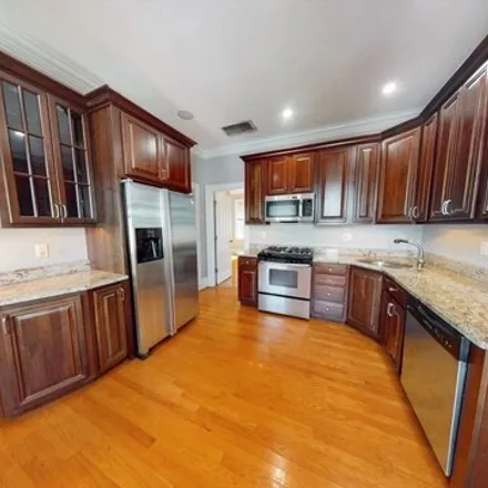 Rent this 4 bed apartment on 30;32 Ward Street in Boston, MA 01125