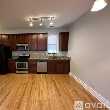 Rent this 2 bed apartment on 3923 W Altgeld St