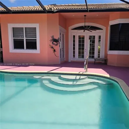 Buy this 4 bed house on 2701 Yarmouth Dr in Wellington, Florida