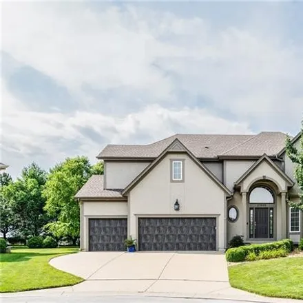 Buy this 5 bed house on 21501 West 100th Street in Lenexa, KS 66220