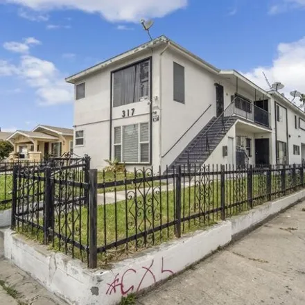 Buy this 9 bed house on 333 West 76th Street in Los Angeles, CA 90003