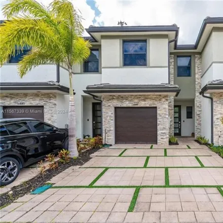 Buy this 3 bed townhouse on unnamed road in Miami Lakes, FL 33018