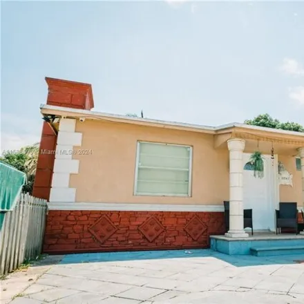 Buy this 3 bed house on 8741 Northwest 33rd Avenue Road in Miami-Dade County, FL 33147