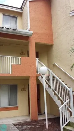 Buy this 2 bed townhouse on 1069 Coral Club Drive in Coral Springs, FL 33071