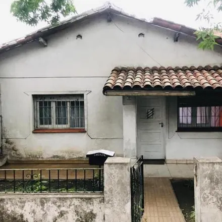 Buy this 2 bed house on Automotores Noriega Hijo in Avenida Presidente Arturo Umberto Illia, Partido de San Miguel