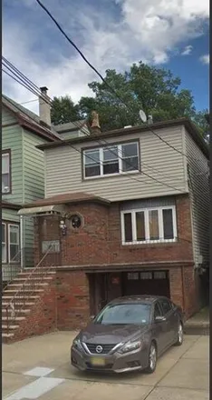 Rent this 3 bed house on 74 Columbia Avenue in Jersey City, NJ 07307