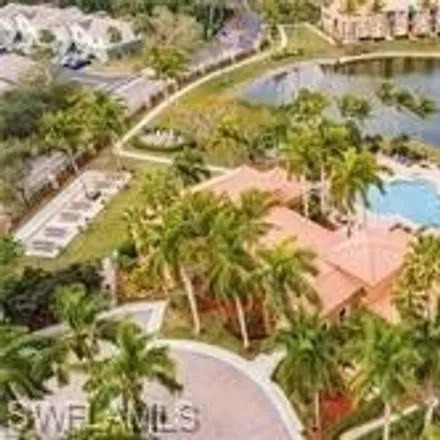 Rent this 3 bed condo on Wildwood Lakes Boulevard in Collier County, FL 34104