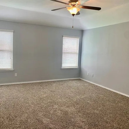 Rent this 3 bed apartment on 291 Oxford Drive in Fate, TX 75189