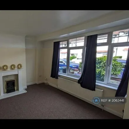 Rent this 4 bed townhouse on Stanley Road in London, CR4 2BH