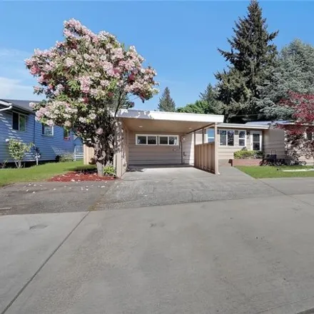 Buy this 4 bed house on 7484 21st Street West in University Place, WA 98466
