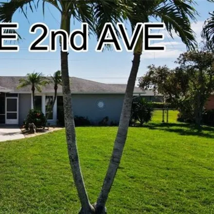 Buy this 3 bed house on 3565 Southeast 2nd Avenue in Cape Coral, FL 33904