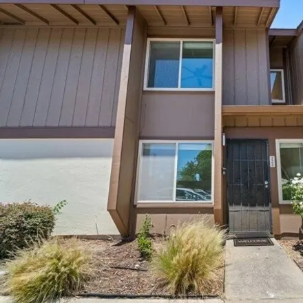 Buy this 3 bed townhouse on 3566 Larchmont Square Ln in Sacramento, California