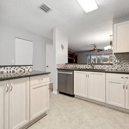 Buy this 3 bed house on 9938 Kamena Court in Palm Beach County, FL 33436
