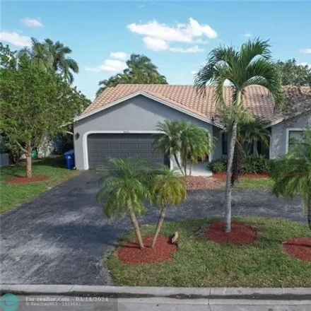 Buy this 4 bed house on 5053 Northwest 64th Drive in Hidden Hammocks Estates, Coral Springs