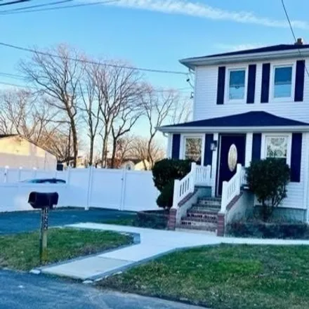 Buy this 4 bed house on 122 43rd Street in North Amityville, NY 11726