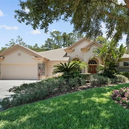 Buy this 5 bed house on 4995 Quill Ct in Palm Harbor, Florida