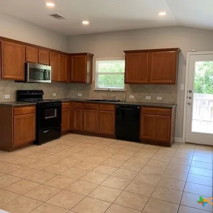 Rent this 4 bed apartment on 2439 Dimmitt Drive in New Braunfels, TX 78130